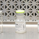 Vials used by pharmacists to prepare syringes for an experimental vaccine.